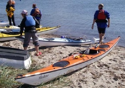 Shadow sea kayak on beach in Denmark, Nigel Foster